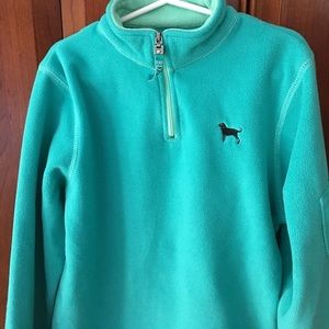Black dog fleece pullover in light teal/aqua